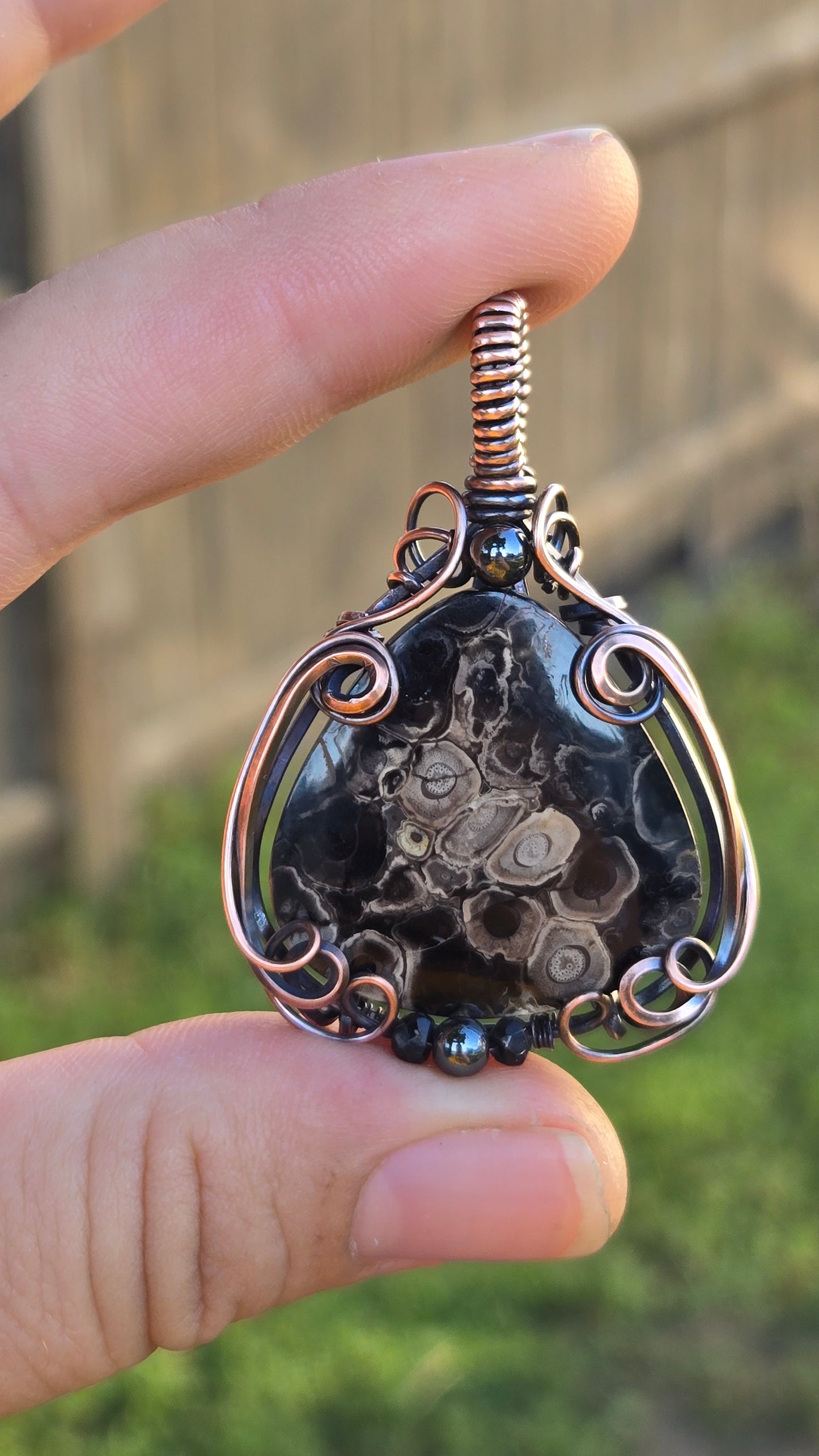 Eye of Palm Root Wire Wrapped Pendant