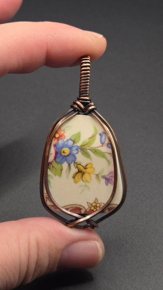 Artisan Cut Porcelain Wire Wrapped Pendant