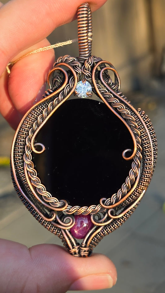Scrying mirror wire-wrapped pendant